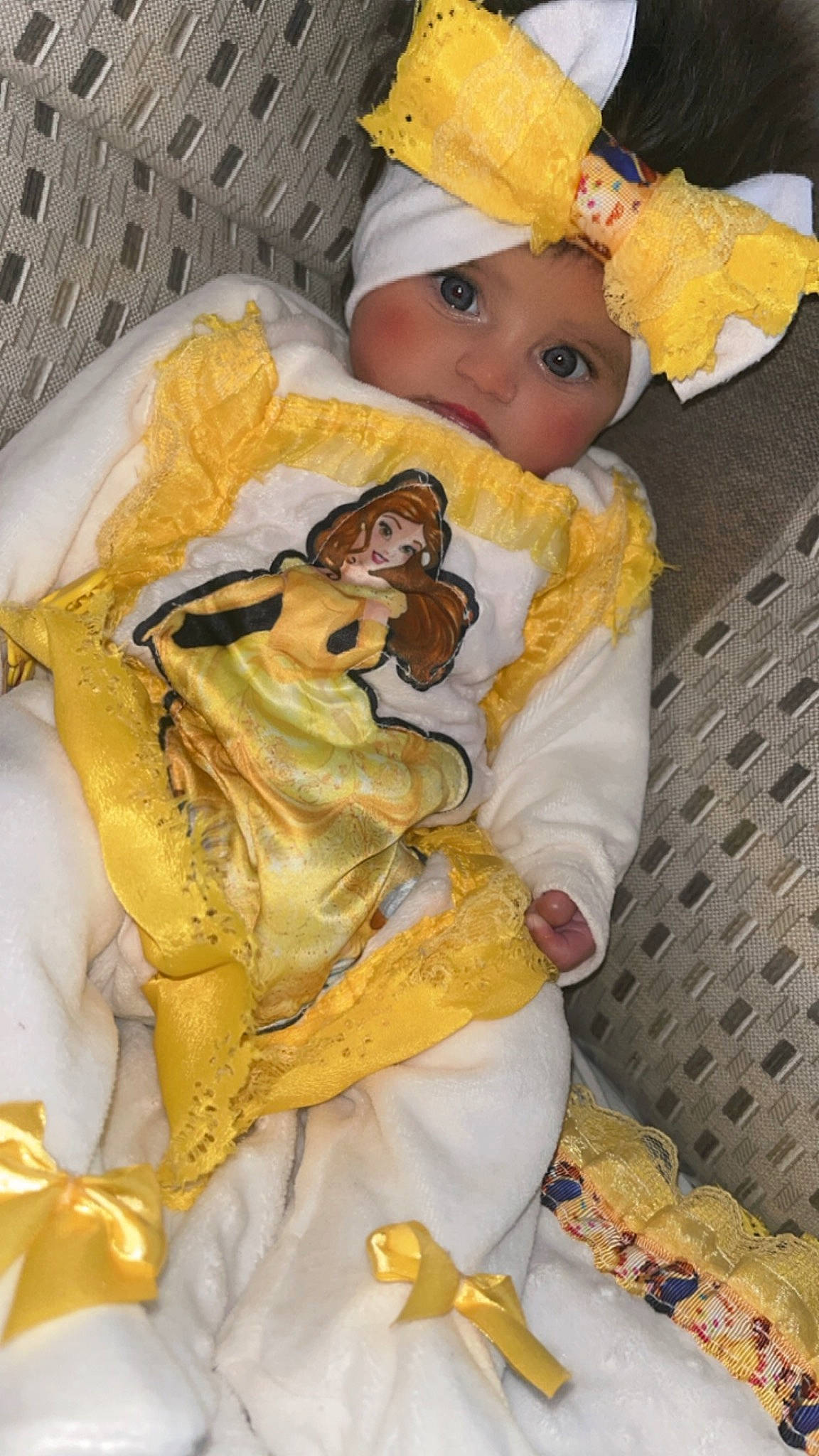 Calyana participe au concours pour gagner de l'argent avec cette photo : baby, baby_products, child, costume_design, doll, event, fashion_design, figurine, fur, headwear, linens, peach, person, room, sleeve, stuffed_toy, textile, toy, tradition, vintage_clothing