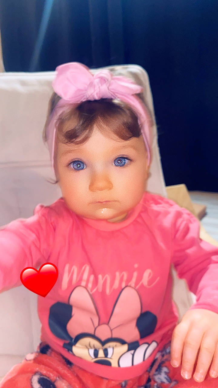 Julia participe au concours pour gagner de l'argent avec cette photo : baby_toddler_clothing, cheek, child, cup, doll, drinkware, eye, eyelash, fun, happy, head, iris, lip, nose, person, pink, sitting, skin, sweetness, toddler