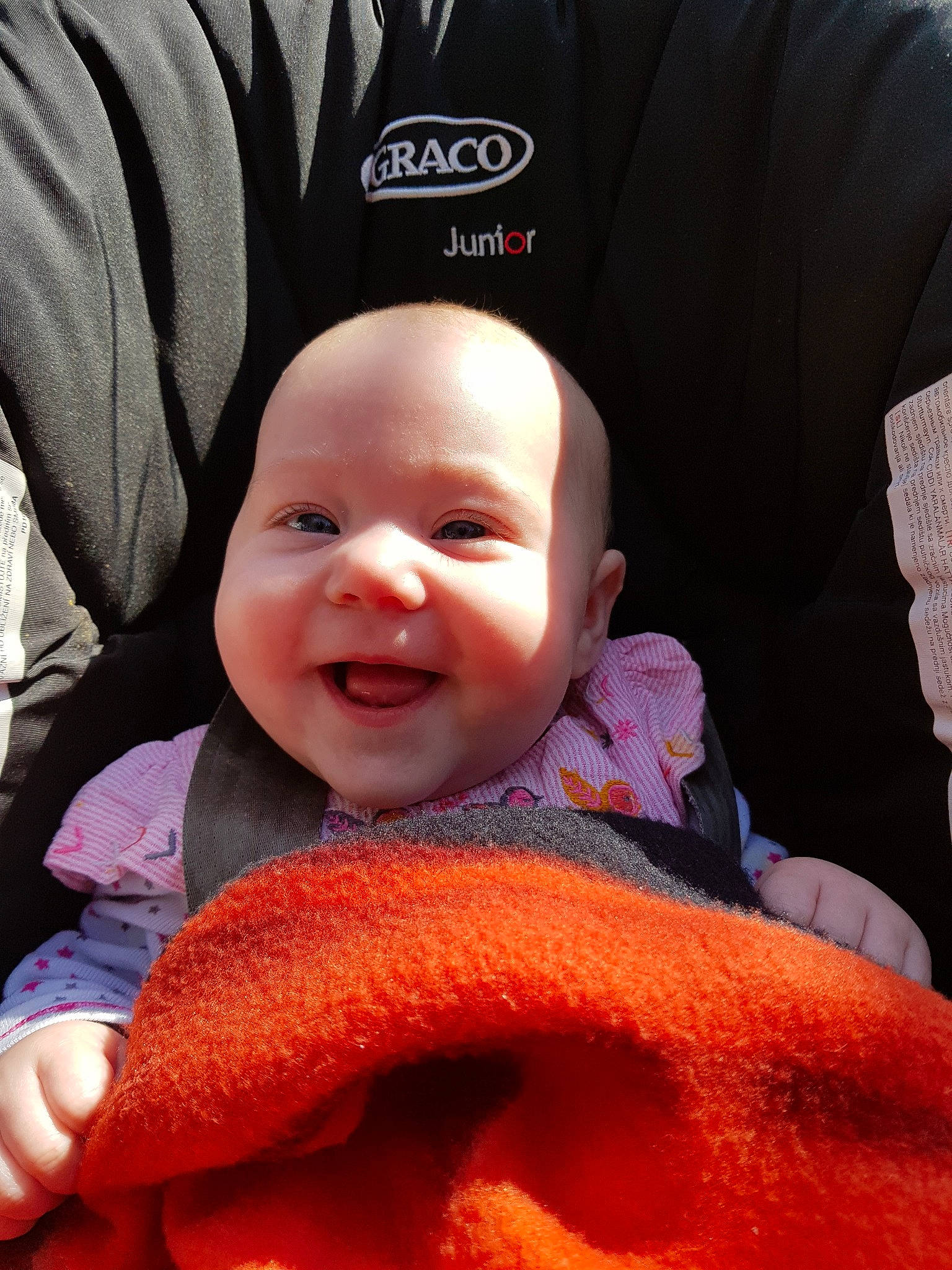 Olyana participe au concours pour gagner de l'argent avec cette photo : baby, cheek, child, face, finger, hand, happy, head, lip, mouth, nose, orange, person, skin, smile, textile, toddler, vacation