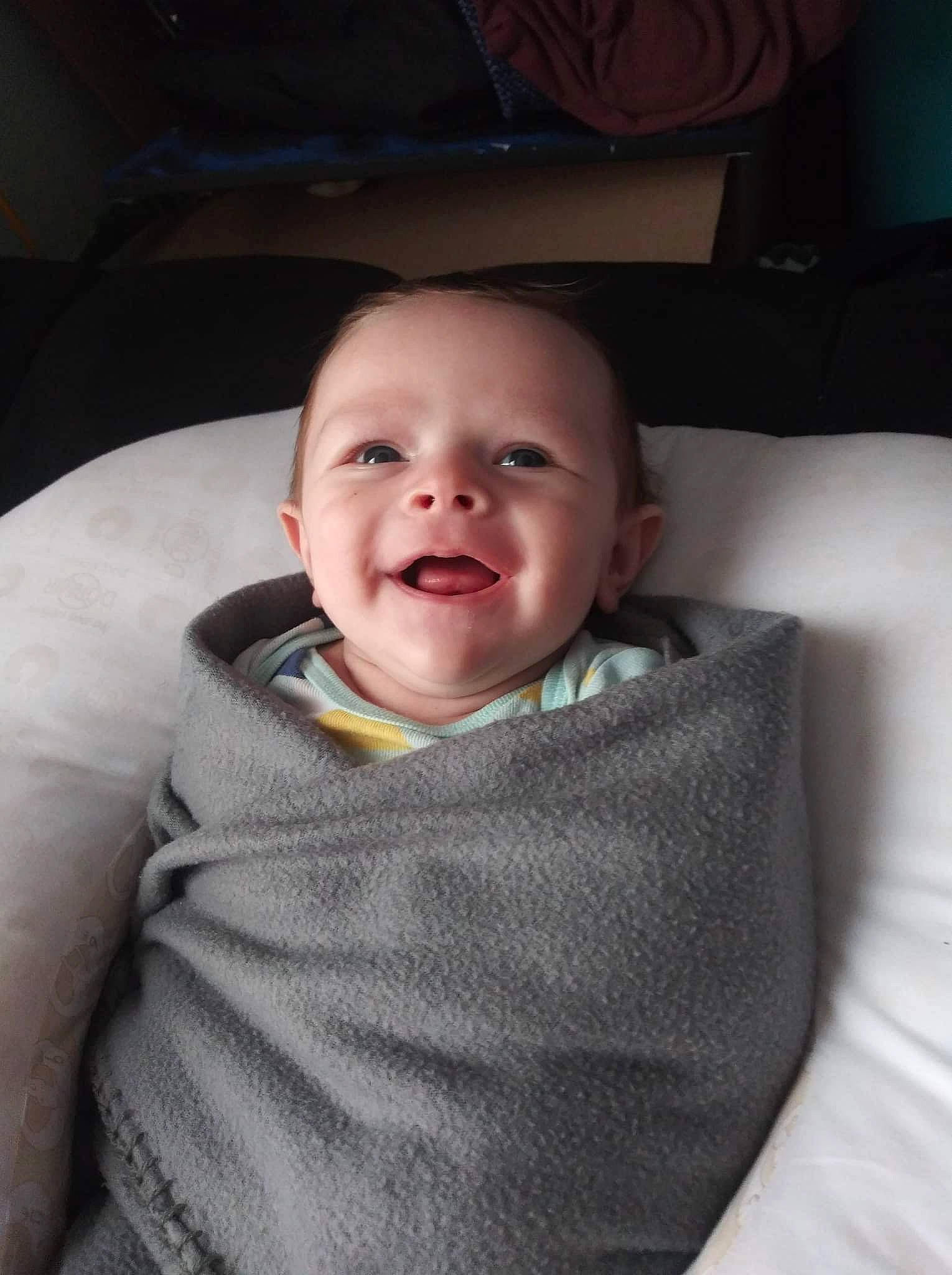 Keith joined the competition — help win amazing prizes! baby, baby_toddler_clothing, car_seat, cheek, child, chin, comfort, eye, eyebrow, flash_photography, iris, linens, lip, mouth, nose, person, sitting, skin, sleeve, smile