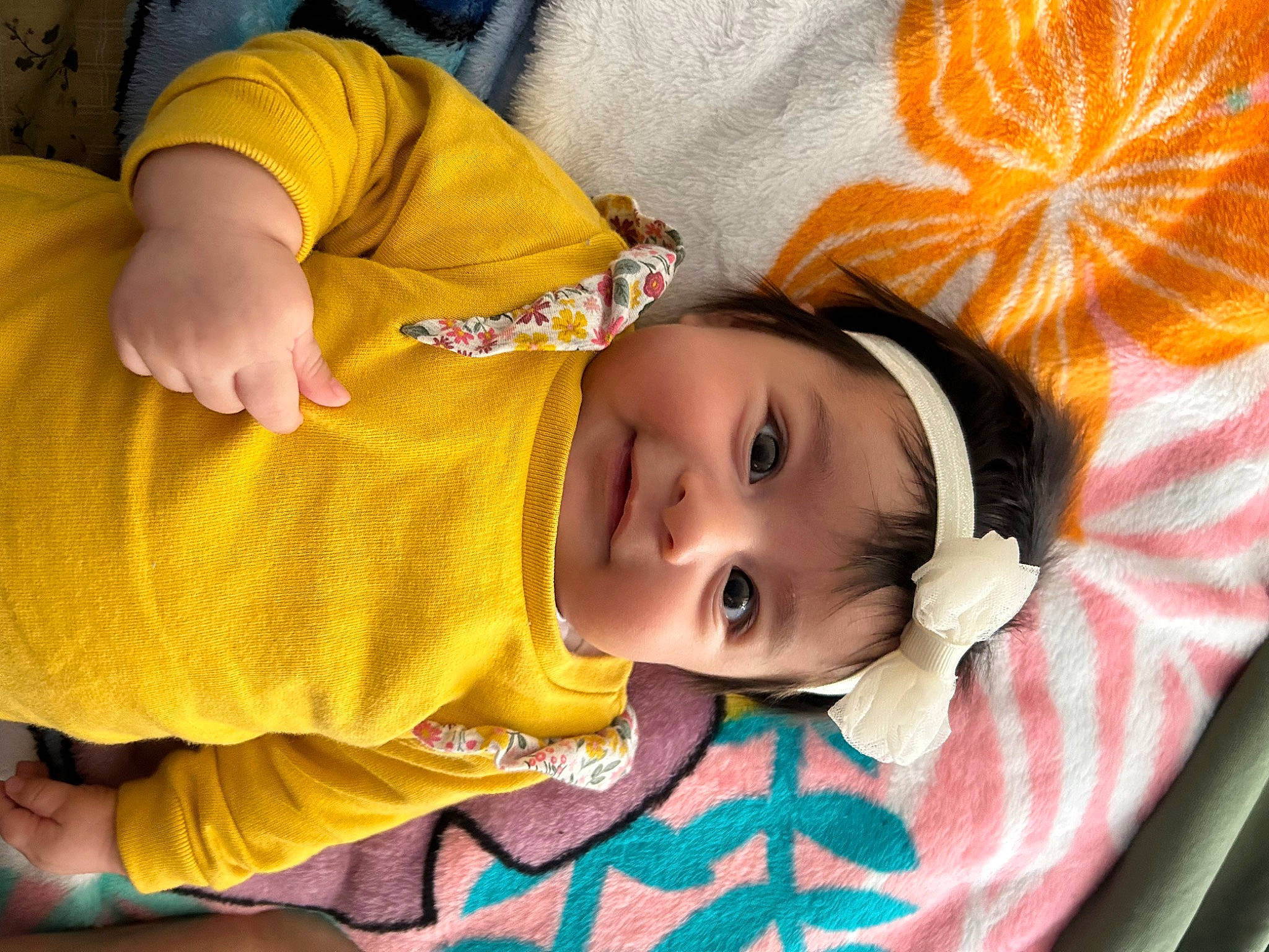 Elsie is registered to the contest to win money with this photo: baby, baby_products, baby_toddler_clothing, cheek, child, eyelash, fun, grass, happy, headwear, iris, joy, nose, orange, person, room, skin, sleeve, smile, textile