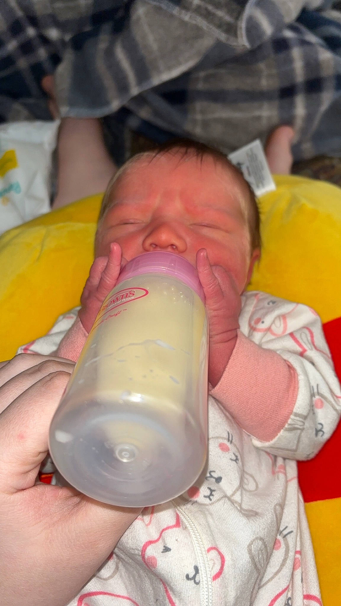 Isabell is registered to the contest to win money with this photo: baby, baby_bottle, baby_products, bottle, buttermilk, child, drink, drinking, drinkware, finger, fluid, infant_formula, milk, person, plant_milk, plastic_bottle, product, skin, soy_milk, toddler