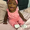 Caylee joined the competition — help win amazing prizes! baby, bed, bracelet, candid, child, cozy, cute, happy, headband, indoor, infant, person, pillow, pink_outfit, portrait, sitting, smiling, soft_lighting, white_socks, young