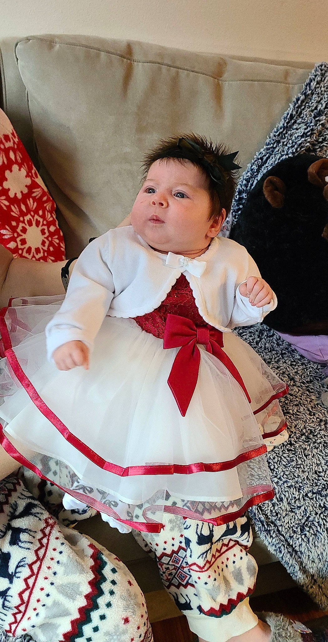 Taylynn joined the competition — help win amazing prizes! baby, baby_products, baby_toddler_clothing, chair, child, dress, embellishment, event, facial_expression, fashion_accessory, fashion_design, formal_wear, fun, gown, happy, person, pink, sitting, textile, toddler