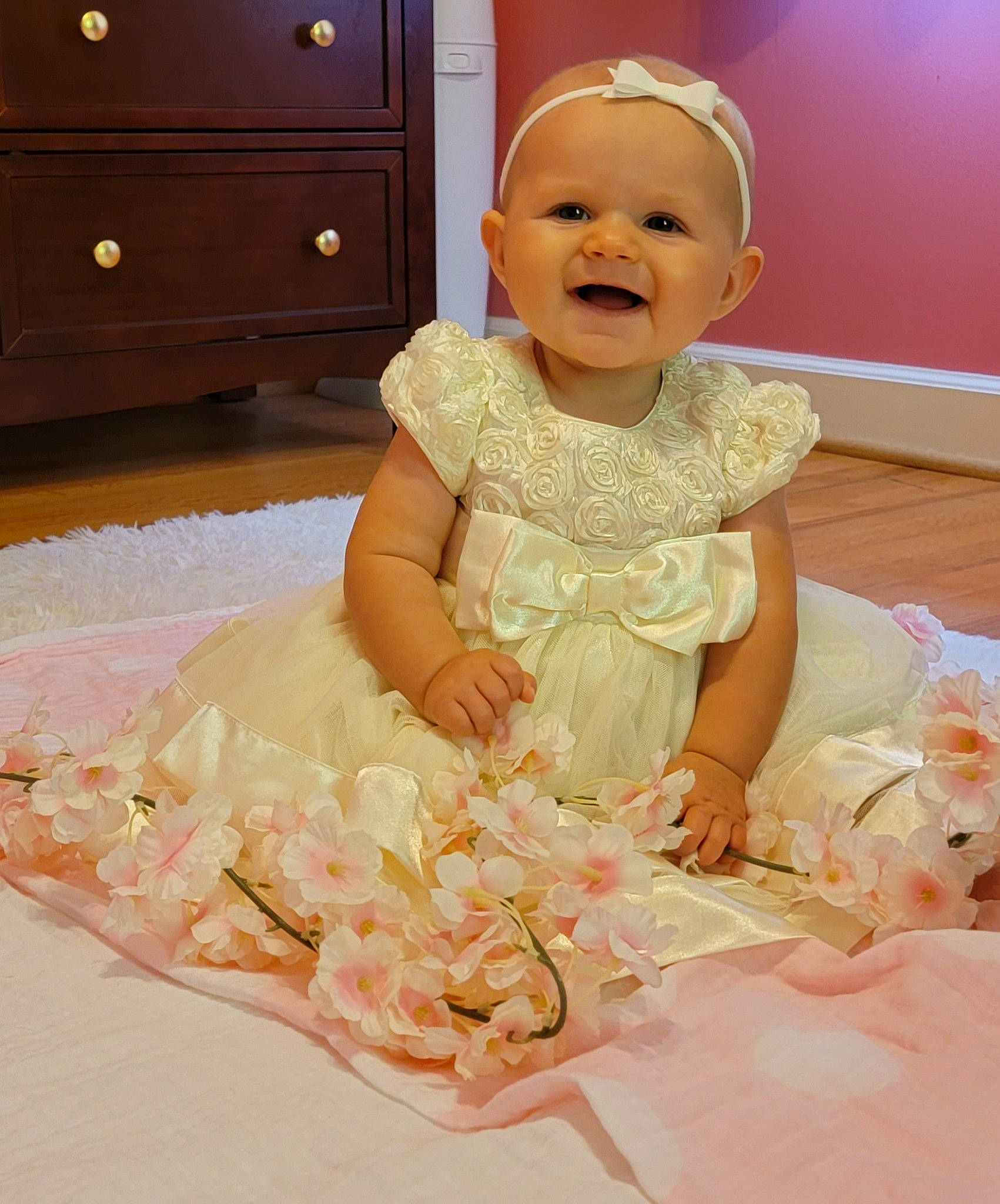 Layla Rae joined the competition — help win amazing prizes! baby, baby_toddler_clothing, cabinetry, child, drawer, dress, event, happy, hat, headpiece, icing, party_supply, peach, person, petal, pink, smile, sugar_cake, sweetness, toddler