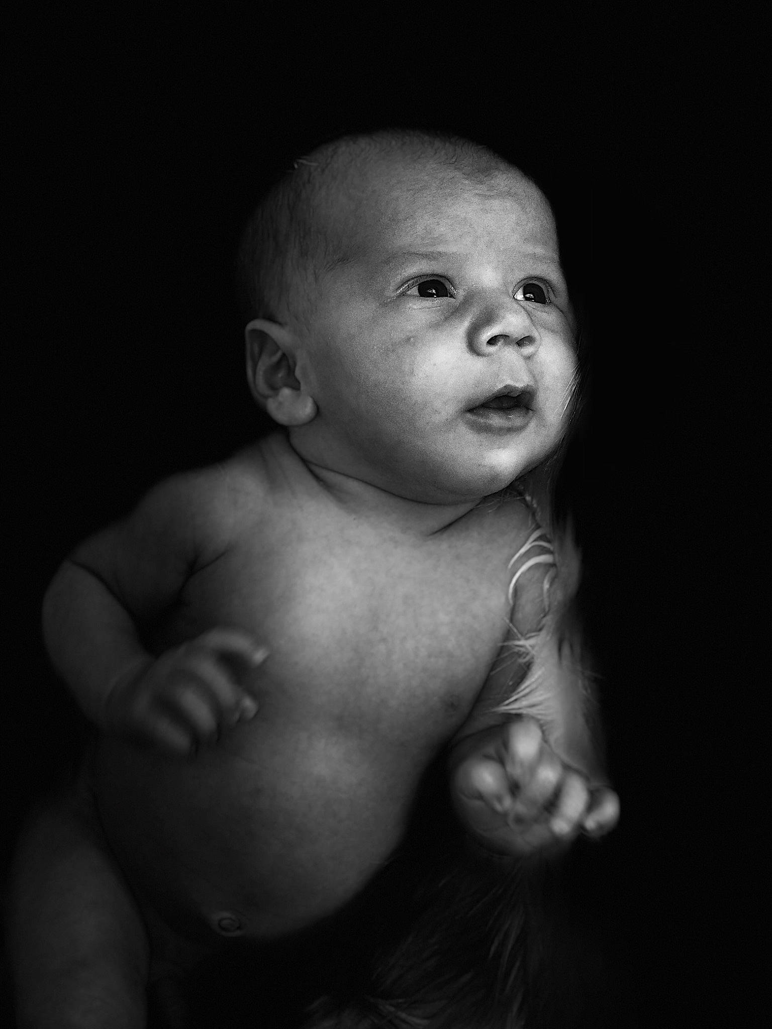 Ernesto is registered to the contest to win money with this photo: black, black_and_white, cheek, child, chin, emotion, eye, face, hand, head, human, infant, monochrome, monochrome_photography, mouth, nose, person, photograph, photography, smile