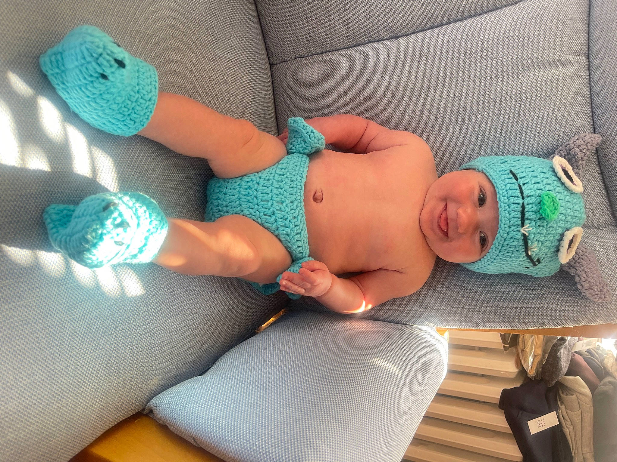 Finnigan joined the competition — help win amazing prizes! arm, azure, baby, baby_toddler_clothing, comfort, finger, foot, hand, headwear, human_body, human_leg, joint, joy, knee, leg, nail, pattern, person, skin, textile