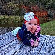Covelea joined the competition — help win amazing prizes! baby, infant, headband, flower, wooden_dock, river, water, grass, trees, nature, jacket, clothing, outdoor, smiling, happy, portrait, child, baby_girl, scenic, cute