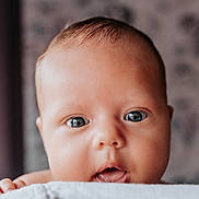 Anna is registered to the contest to win money with this photo: baby, bodypart, face, finger, frown, hand, happy, head, mouth, newborn, person, photography, portrait, sad, skin, smile