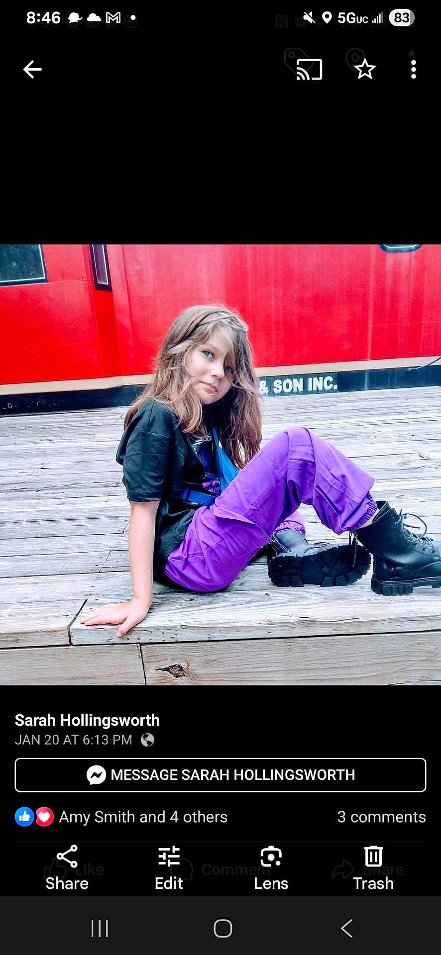 Cora joined the competition — help win amazing prizes! child, girl, purple_pants, black_tshirt, black_boots, wooden_steps, red_background, long_hair, casual_pose, outdoor, daylight, blue_eyes, young_person, relaxed, seated, side_view, fashion, urban, portrait, person