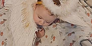 Leah joined the competition — help win amazing prizes! adorable, angel_costume, baby, blanket, child, costume, cute, decorative, floral_pattern, halo, headband, indoors, infant, laying_down, peaceful, pink, sleepy, soft_texture, white, wings