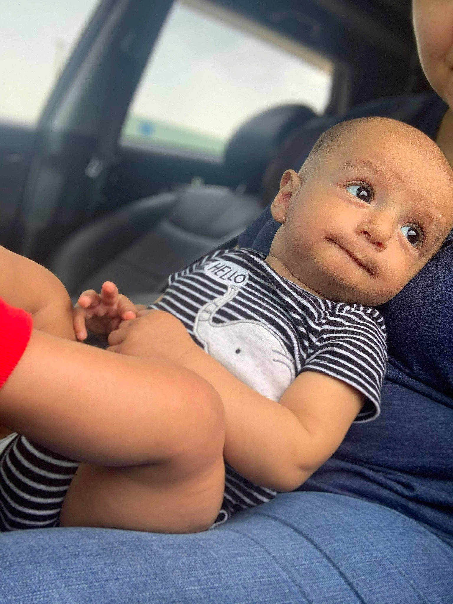 Axl joined the competition — help win amazing prizes! baby, baby_products, baby_toddler_clothing, car_seat, car_seat_cover, child, comfort, elbow, finger, head_restraint, nail, person, sitting, skin, thumb, toddler, undergarment, vehicle_door