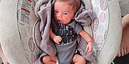 Mateo joined the competition — help win amazing prizes! baby, infant, onesie, blanket, baby_rocker, baby_toy, feet, person, clothing, indoor, pattern, fabric, cute, newborn, soft, seat, curious, small, child, wrapped
