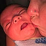 Joe Michale Segura is registered to the contest to win money with this photo: baby, newborn, person, kiss, face, closeup, sleeping, blanket, skin, love, affection, cozy, warm_light, portrait, family, intimacy, cheek, human, tenderness, bond