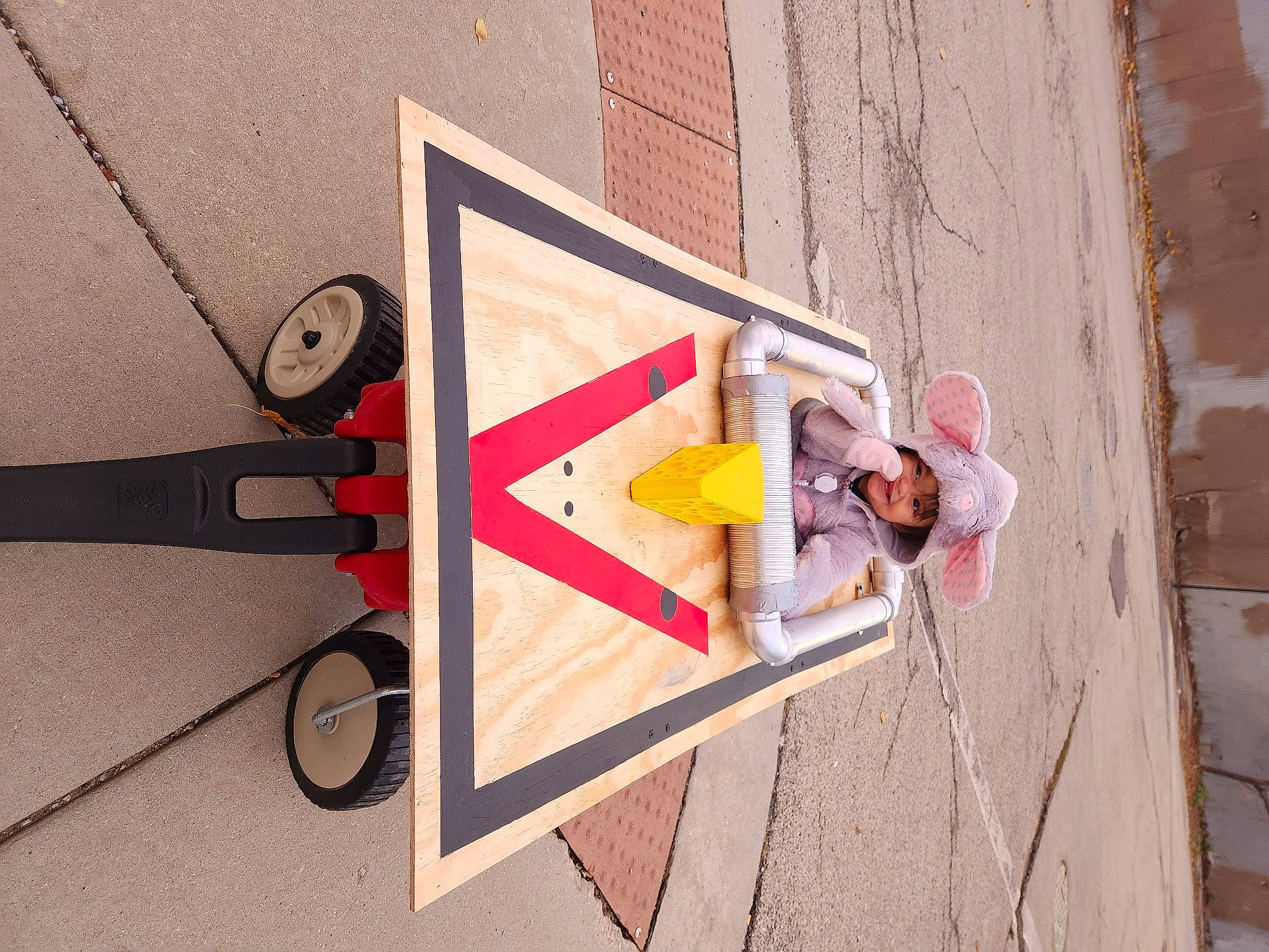 Briana joined the competition — help win amazing prizes! art, brick, cement, circle, concrete, electrical_supply, eyewear, facade, font, headwear, person, plaster, rectangle, room, shadow, visual_arts, window, wire, wood