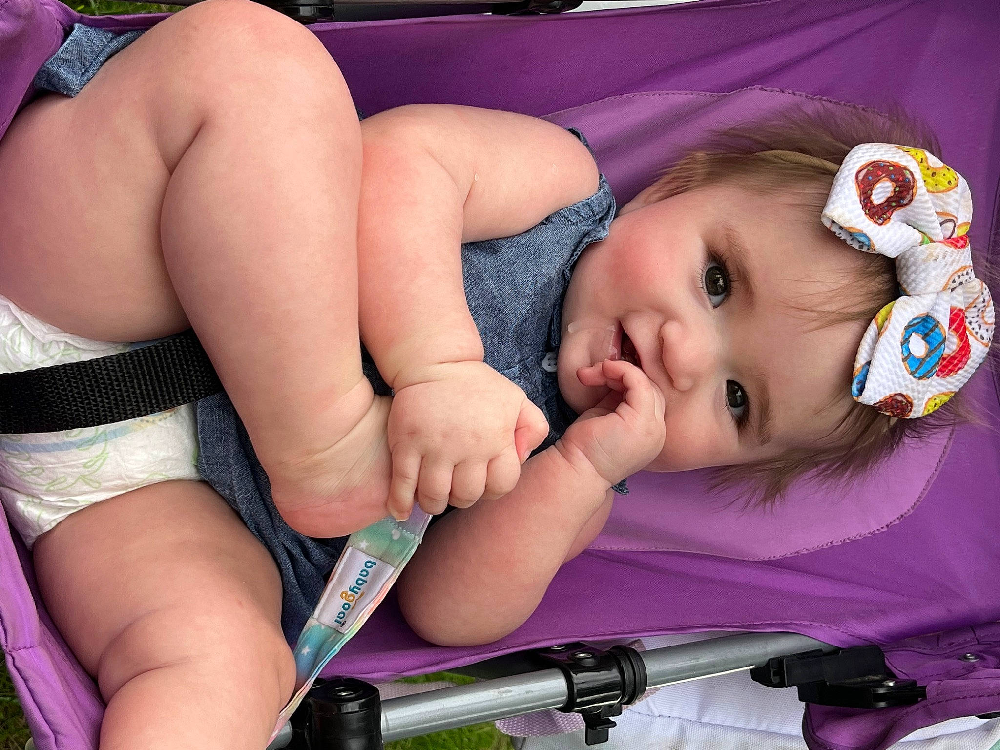 Amilia is registered to the contest to win money with this photo: baby, baby_toddler_clothing, cheek, eyebrow, eyelash, finger, hair, hairstyle, happy, headwear, human_body, iris, leg, lip, mouth, neck, nose, person, skin, smile