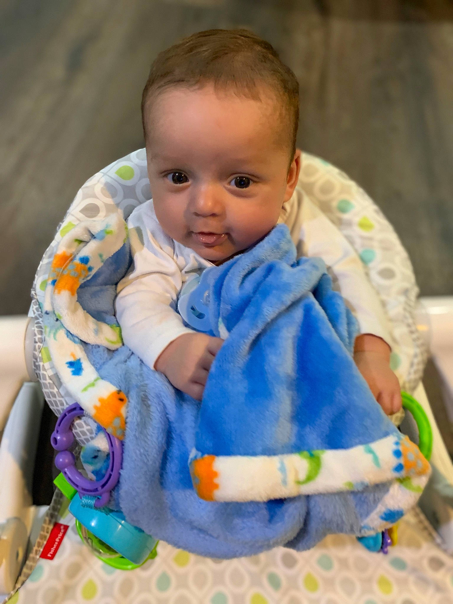 Kyrin is registered to the contest to win money with this photo: baby, baby_products, baby_toddler_clothing, cheek, child, collar, dress, electric_blue, eye, happy, head, human_body, iris, linens, outerwear, pattern, person, sitting, skin, sleeve