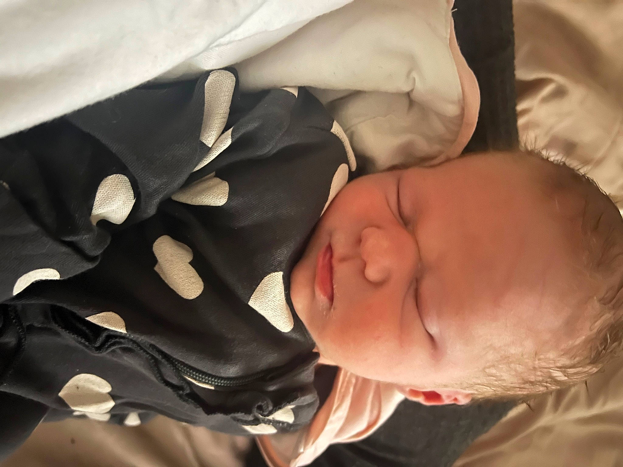 Arabella is registered to the contest to win money with this photo: arm, baby, baby_products, cheek, child, comfort, eyelash, finger, gesture, hand, happy, human_body, linens, nap, nose, person, plant, room, sleep, toddler