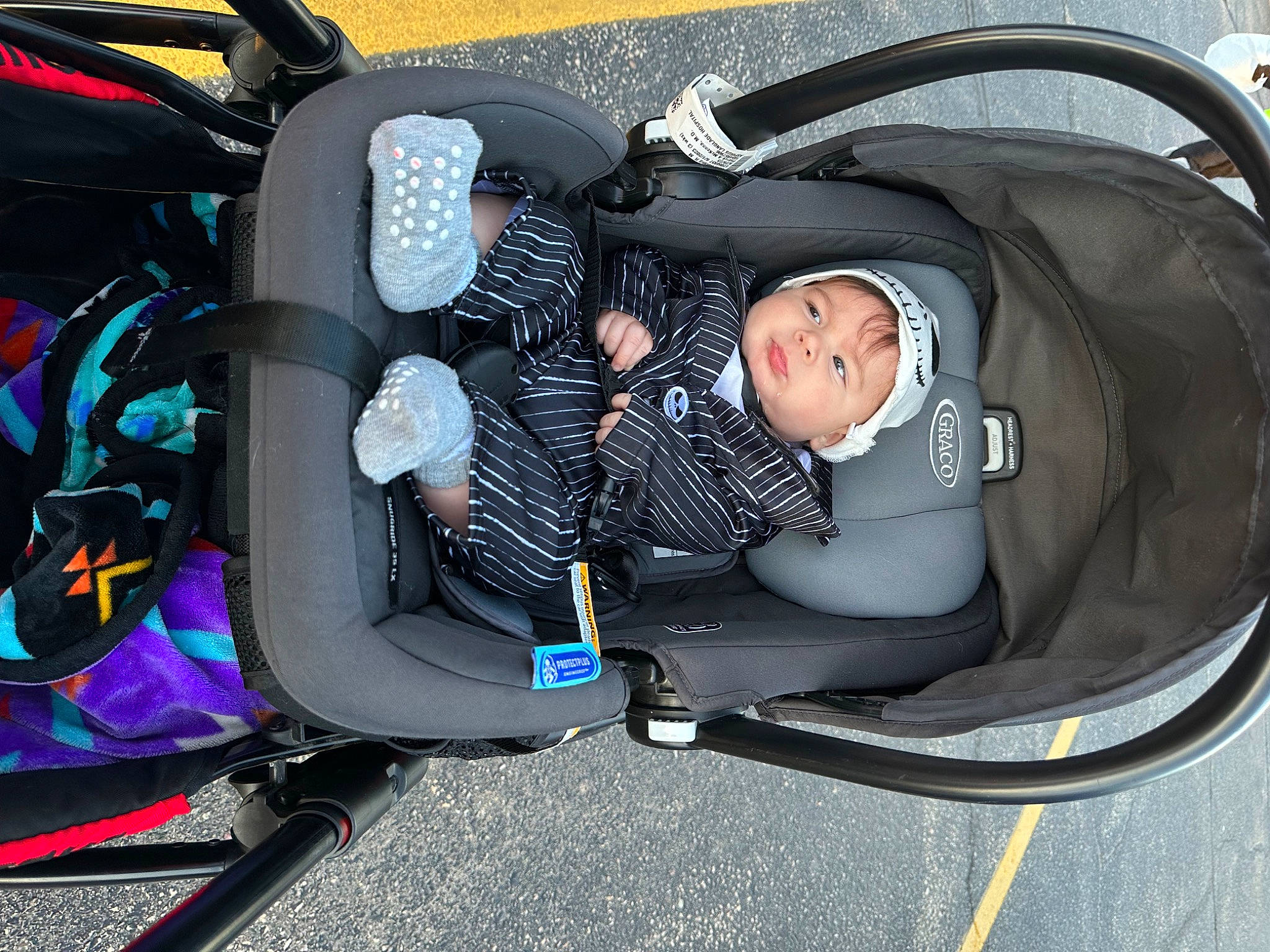 Roland is registered to the contest to win money with this photo: auto_part, baby, baby_carriage, baby_products, baby_safety, baby_toddler_clothing, bag, baggage, car_seat, child, comfort, headwear, luggage_and_bags, person, personal_protective_equipment, product, steering_wheel, toddler, vehicle