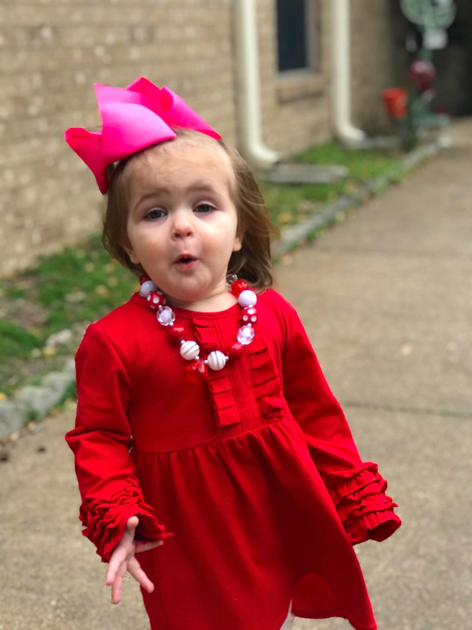 Novaleigh joined the competition — help win amazing prizes! child, child_model, clothing, costume, dress, magenta, outerwear, person, pink, red, sleeve, smile, surprise, toddler, tradition
