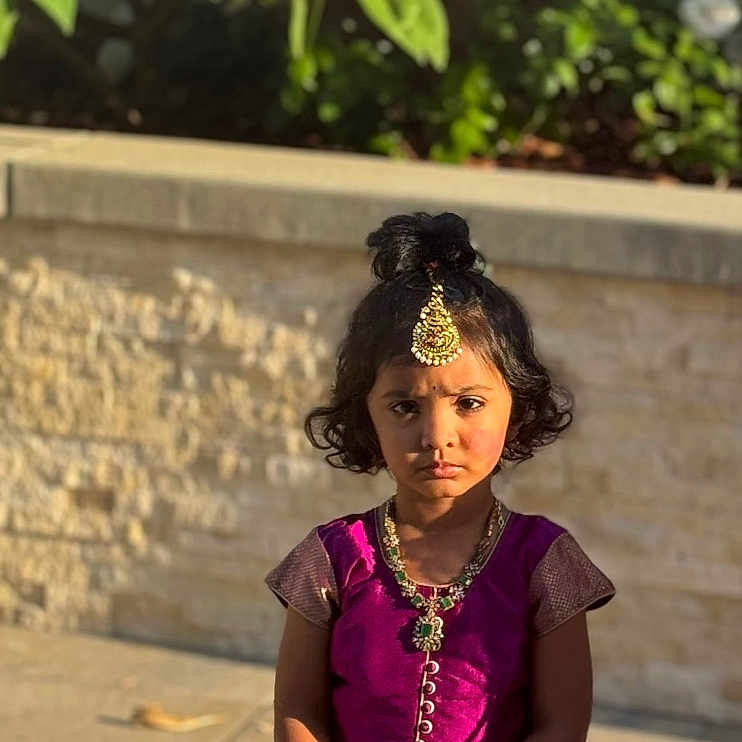Vidhigya Rallabhandi is registered to the contest to win money with this photo: accessories, child, clothing, costume, face, female, flower, girl, head, herbal, herbs, jewelry, necklace, person, petal, photography, plant, portrait, pottedplant, purple