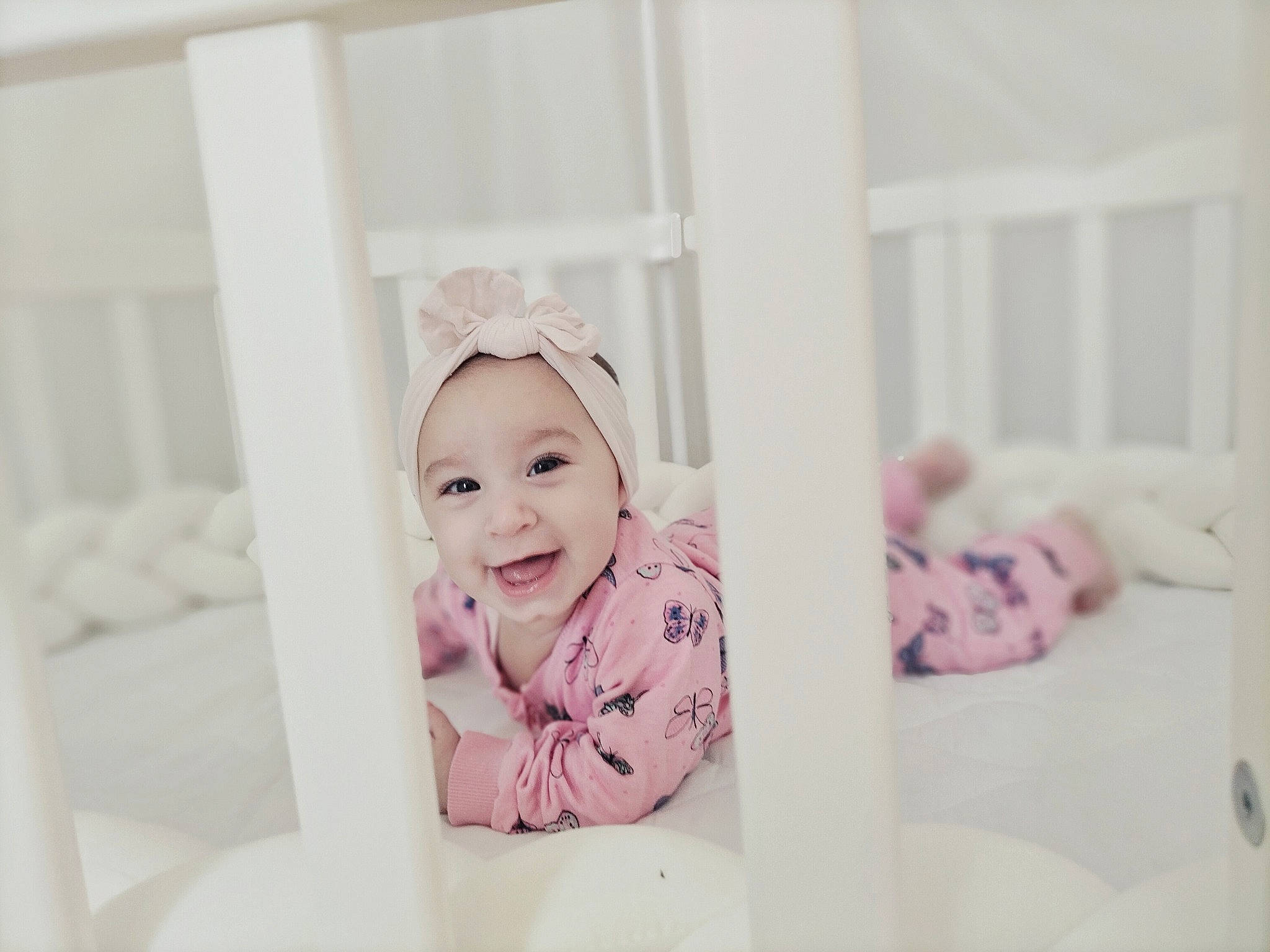 Inaya participe au concours pour gagner de l'argent avec cette photo : baby, baby_laughing, baby_toddler_clothing, child, comfort, dress, face, happy, headwear, laugh, linens, magenta, person, picture_frame, portrait, portrait_photography, room, sitting, sleeve, smile