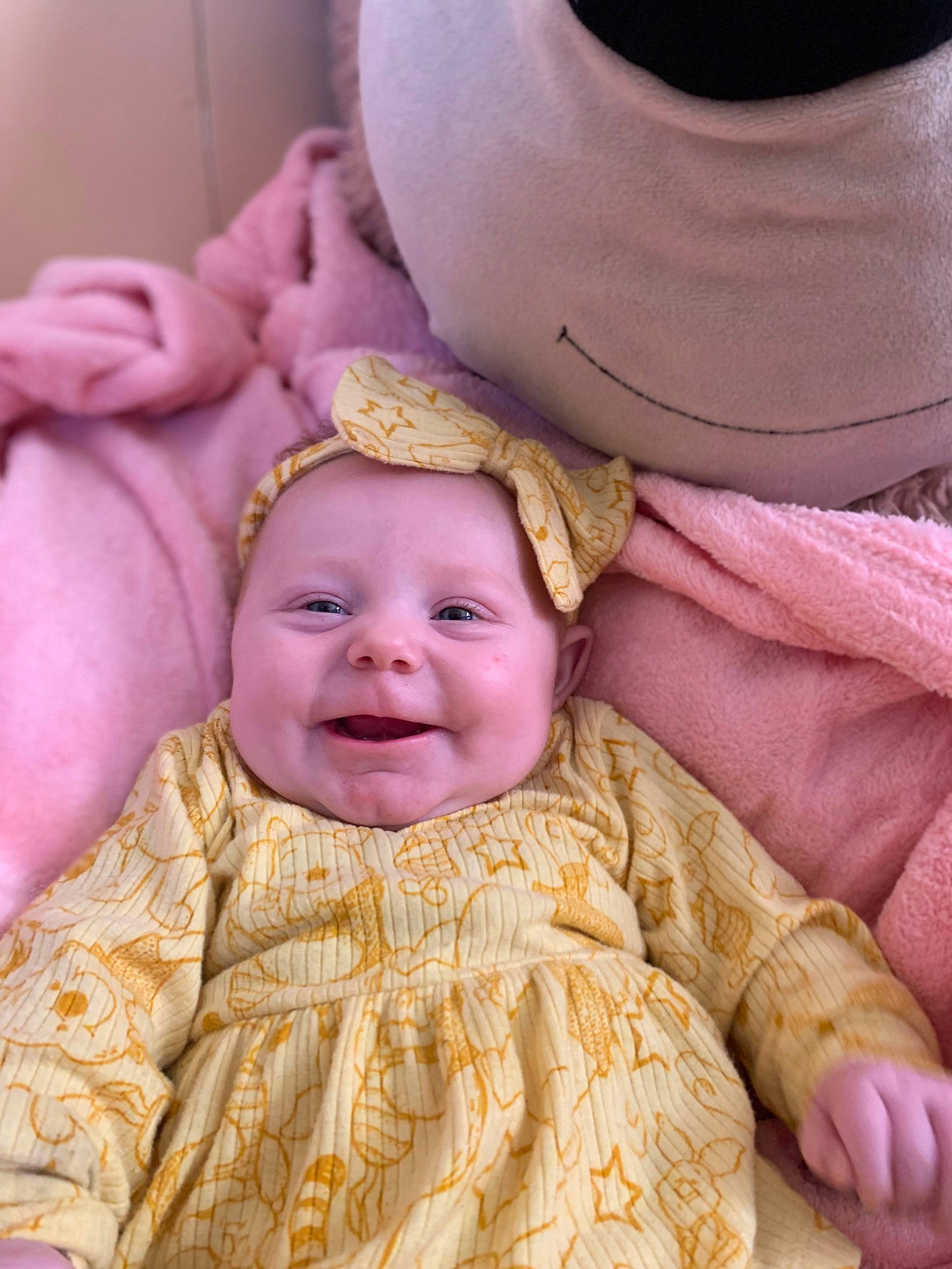 Juniper is registered to the contest to win money with this photo: baby, baby_toddler_clothing, cheek, child, chin, event, eye, fashion_accessory, fun, happy, hat, head, headgear, headwear, joy, magenta, person, pink, skin, smile