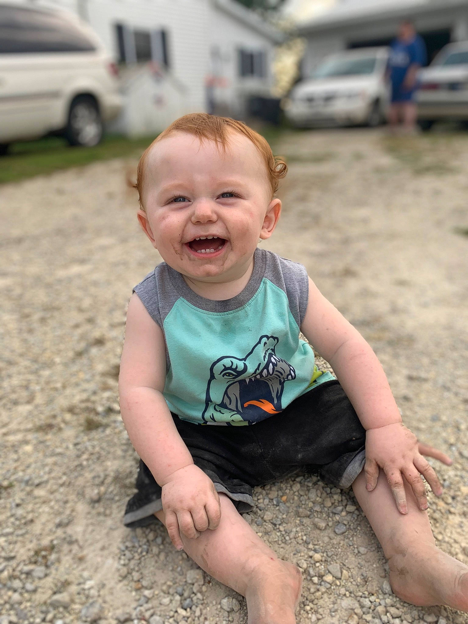 Turner is registered to the contest to win money with this photo: automotive_tire, baby, baby_toddler_clothing, barefoot, car, child, eye, finger, fun, grass, hand, happy, joy, leg, mammal, mouth, person, skin, smile, summer
