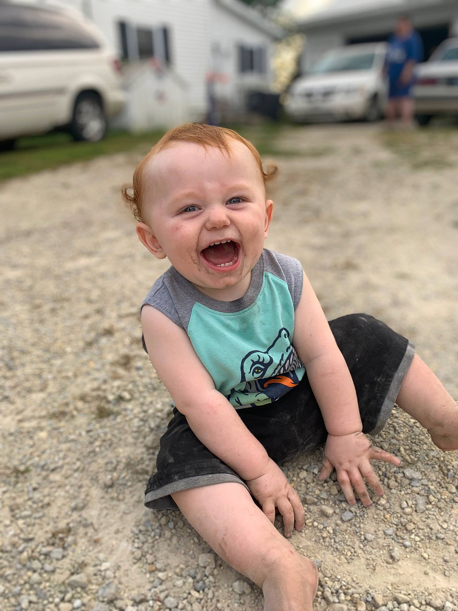 Turner is registered to the contest to win money with this photo: asphalt, automotive_tire, child, eye, flash_photography, fun, grass, hairstyle, happy, leg, leisure, mammal, person, road_surface, sand, skin, smile, summer, t_shirt, toddler