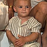 toddler, child, baby, portrait, sitting, indoors, family, adult, striped_shirt, shorts, watermelon, summer, face, eyes, arms, folded_arms, wood_floor, furniture, close_up, photography