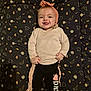 Mackenzie a rejoint le concours — aidez-le/la à gagner de superbes lots ! baby, child, smiling, headband, pants, blanket, space, stars, planets, constellations, tongue_out, cute, infant, clothing, lying_down, happy, indoors, person, portrait, playful