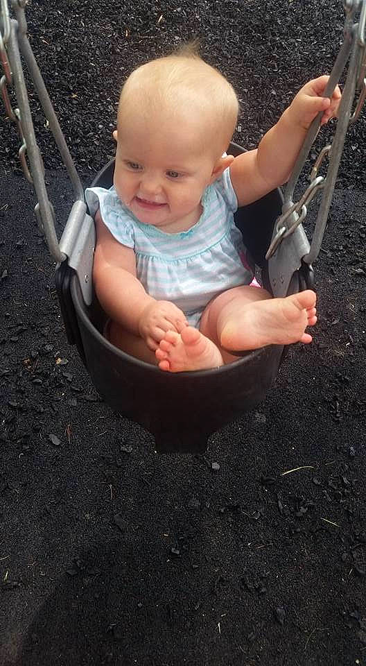 Gracie is registered to the contest to win money with this photo: baby, child, joy, outdoor_play_equipment, person, play, product, swing, toddler
