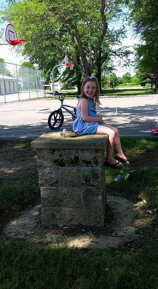 Kaidynce is registered to the contest to win money with this photo: bicycle, furniture, grass, joy, leg, park, person, photography, plant, recreation, sitting, tree, vehicle, wheel