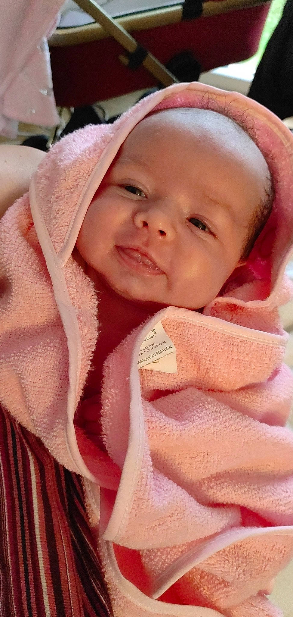 Tahya participe au concours pour gagner de l'argent avec cette photo : baby, baby_products, cheek, comfort, eyebrow, fashion_accessory, grass, happy, iris, linens, lip, magenta, nose, peach, person, pink, skin, smile, textile, thumb