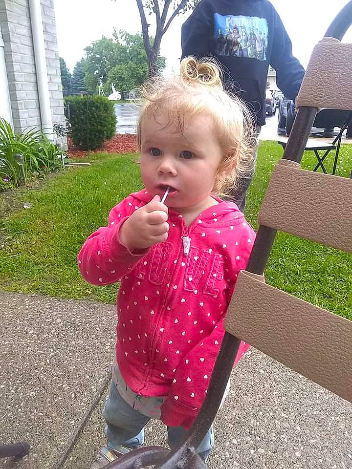 Emma Marie Kilbourne is registered to the contest to win money with this photo: baby, child, family, food, fun, garden, grass, grass_family, leaf, person, pink, plant, play, summer, toddler, vacation