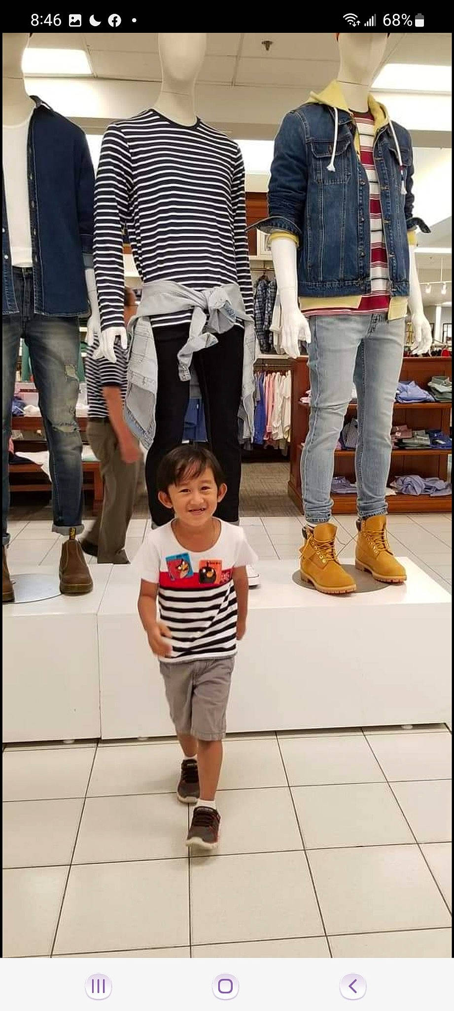 John is registered to the contest to win money with this photo: black, cool, fashion, footwear, gesture, human, joint, joy, leg, line, people, person, photograph, shoe, shorts, sleeve, sneakers, standing, style, thigh