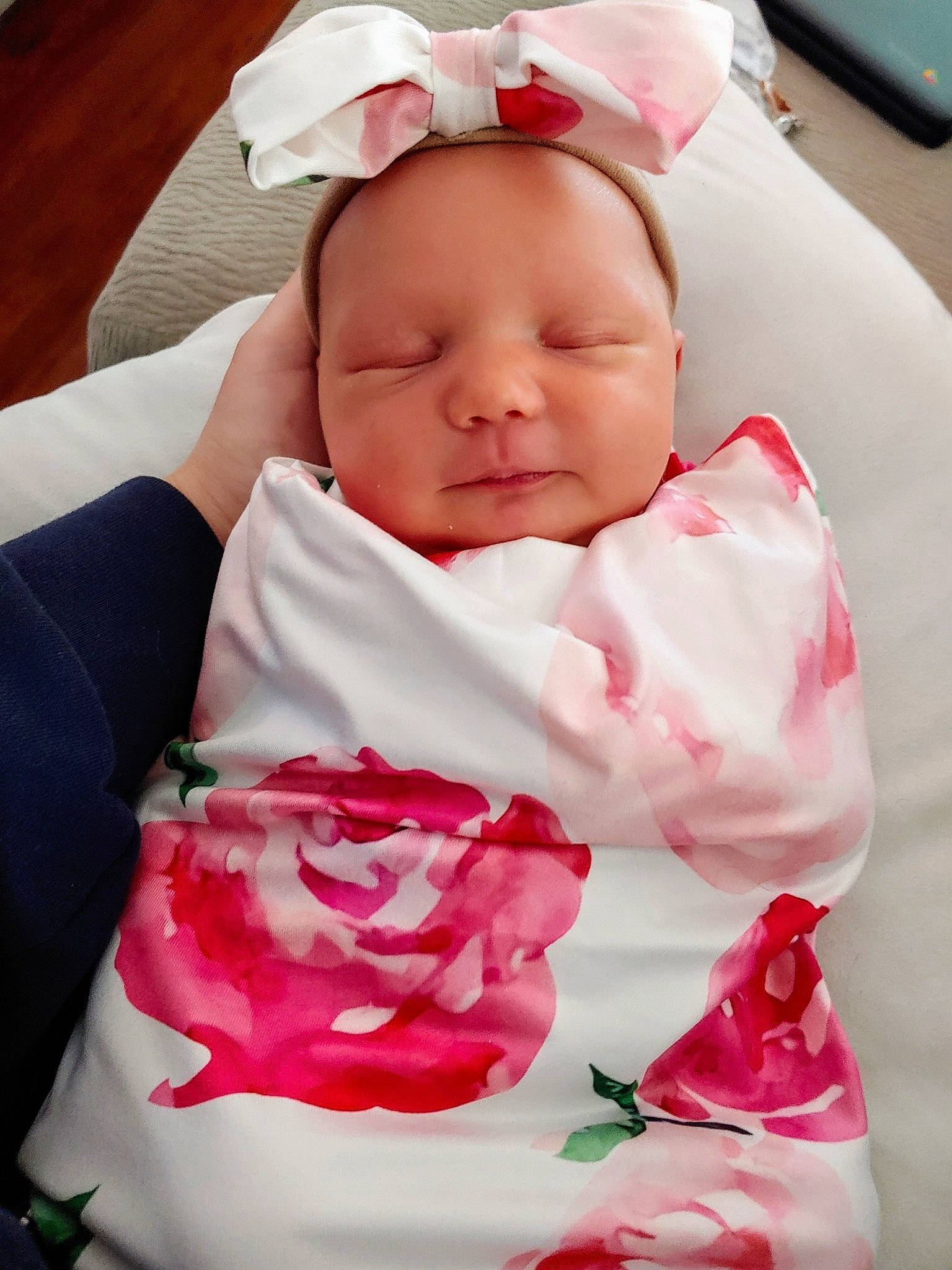 Hannah is registered to the contest to win money with this photo: baby, baby_sleeping, birth, cheek, child, face, facial_expression, happy, head, lip, mouth, nose, person, pink, red, rose, skin, smile, toddler