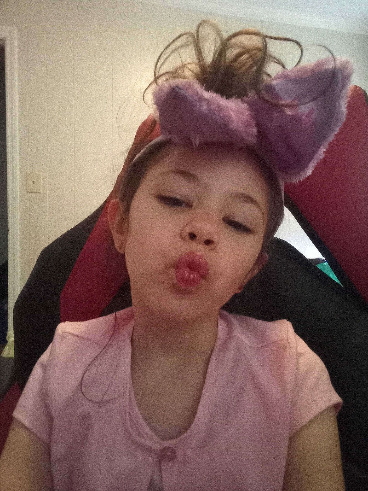 Riddley is registered to the contest to win money with this photo: black_hair, cool, door, ear, eye, eyebrow, eyelash, eyewear, forehead, fun, happy, headgear, headpiece, jaw, lip, long_hair, mammal, neck, person, pink