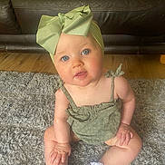 Paisley joined the competition — help win amazing prizes! baby, bonnet, cap, clothing, costume, couch, dress, face, furniture, hat, head, homedecor, hosiery, pants, person, photography, portrait, sitting, sock, wood