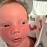 Elijah is registered to the contest to win money with this photo: newborn, baby, infant, portrait, close_up, face, eyes, nose, mouth, sleepy, serious, blanket, swaddle, bedding, indoor, closeup_photography, head, skin, lying_down, hospital_baby