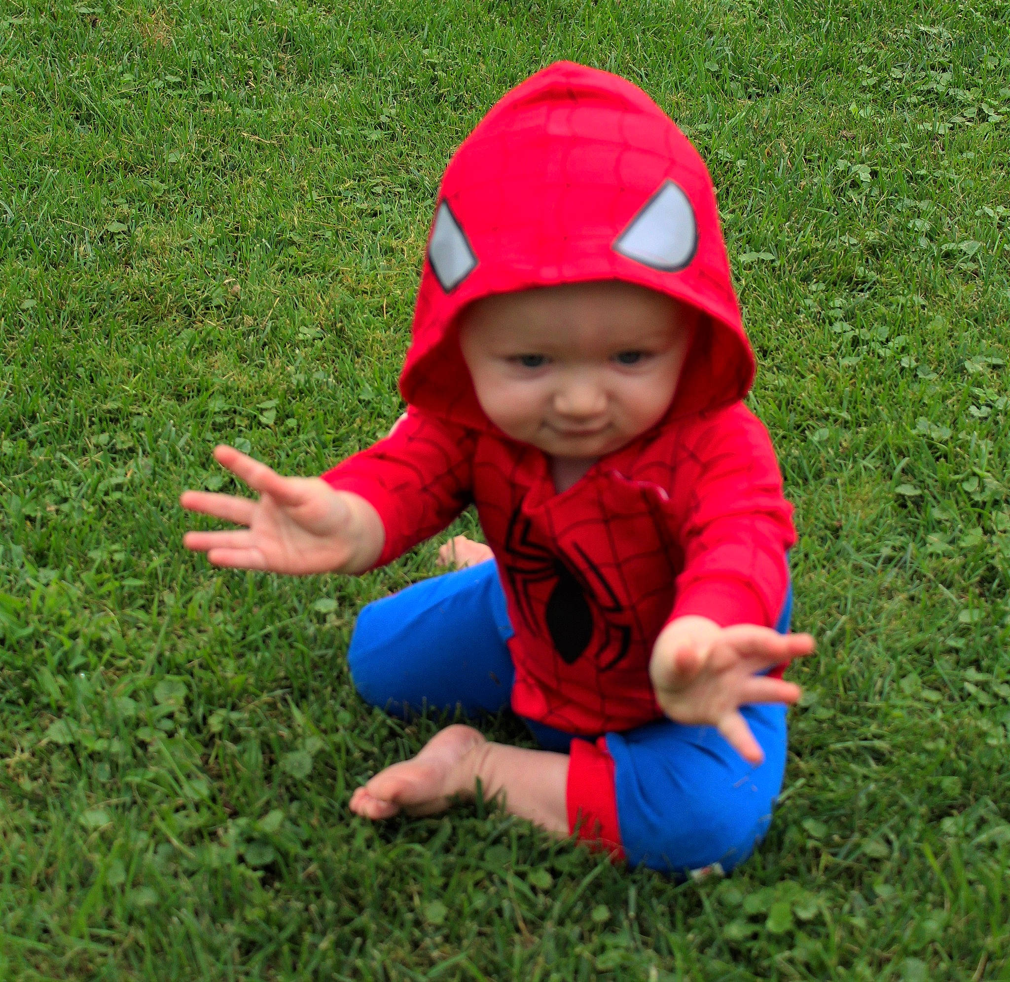 Ryley is registered to the contest to win money with this photo: baby, baby_toddler_clothing, baseball_cap, cap, fun, grass, grass_family, grassland, groundcover, hand, happy, headwear, lawn, leaf, leisure, meadow, people_in_nature, person, plant, recreation