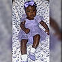 baby, bed, bonnet, clothing, couch, doll, dress, face, footwear, formalwear, furniture, hat, head, person, photography, portrait, shoe, sitting, toy