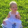 Jade is registered to the contest to win money with this photo: barefoot, casual, child, cute, daylight, dress, grass, greenery, happy, nature, outdoor, person, playing, portrait, sitting, smiling, summer, sunlight, toddler, young_child