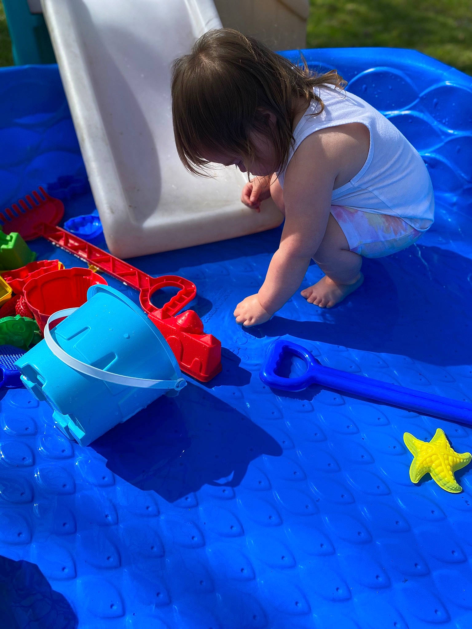 Kaiah joined the competition — help win amazing prizes! azure, blue, carmine, child, electric_blue, flooring, fun, human_leg, leisure, pattern, person, plastic, play, recreation, red, sandal, shorts, textile, toddler, visual_arts