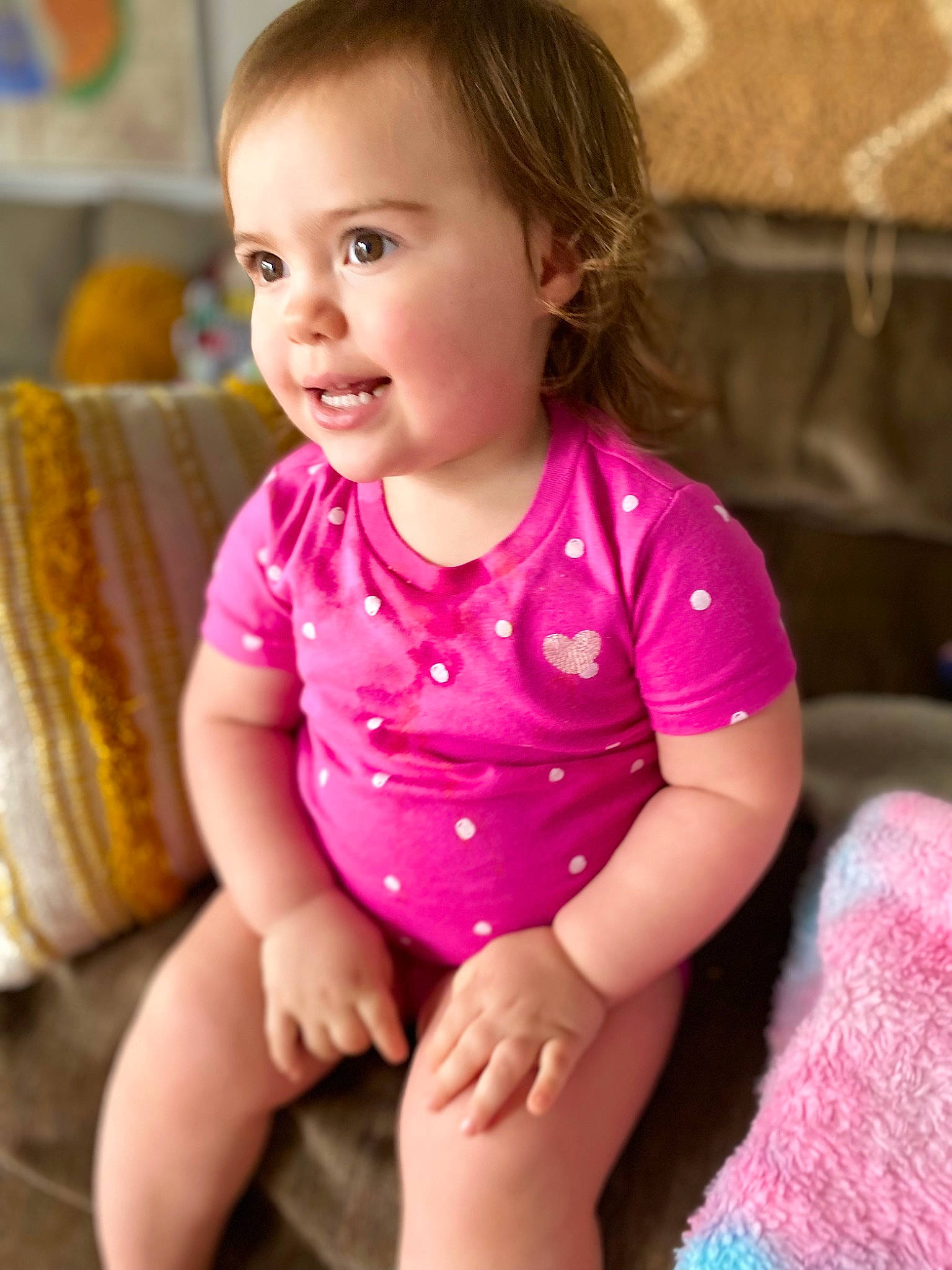 Kaiah is registered to the contest to win money with this photo: baby_toddler_clothing, cheek, elbow, face, finger, fun, hairstyle, happy, head, iris, lip, neck, nose, person, pink, shoulder, skin, sleeve, smile, standing