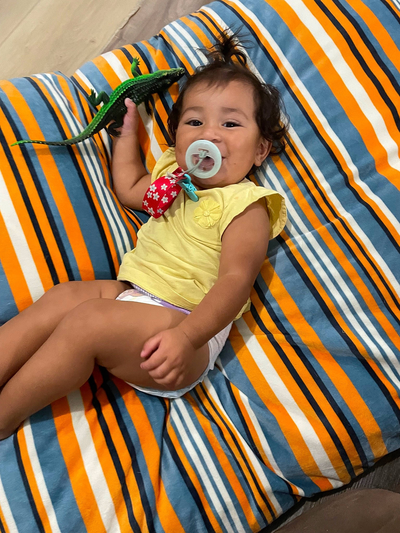 Lydia joined the competition — help win amazing prizes! arm, baby, baby_toddler_clothing, beauty, chair, child, comfort, couch, dress, eye, fun, happy, head, orange, pattern, person, skin, sleeve, textile, thigh