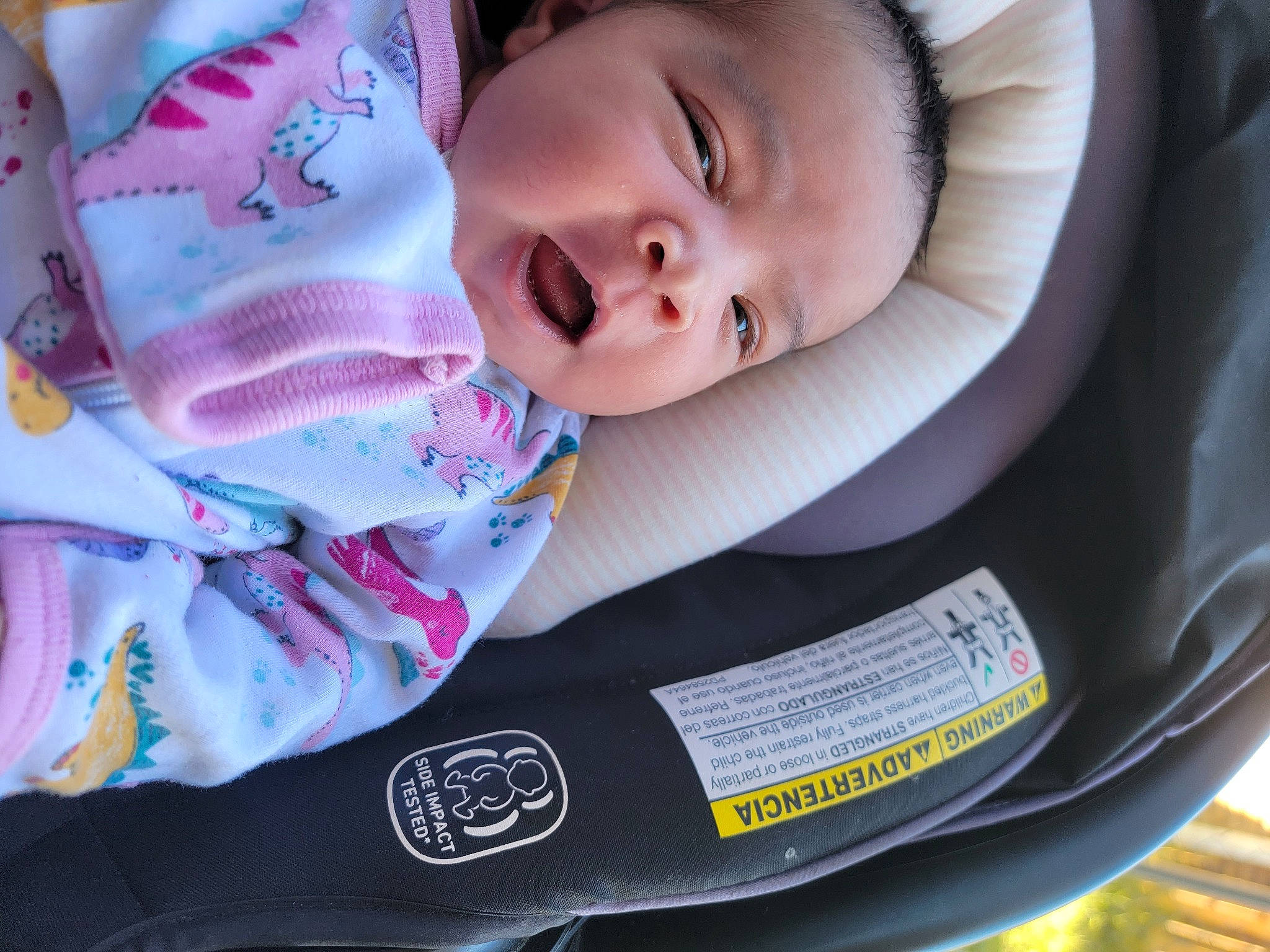 Essence is registered to the contest to win money with this photo: baby, baby_carriage, baby_products, baby_safety, baby_toddler_clothing, carmine, cheek, child, comfort, linens, person, sitting, sleeve, toddler, white