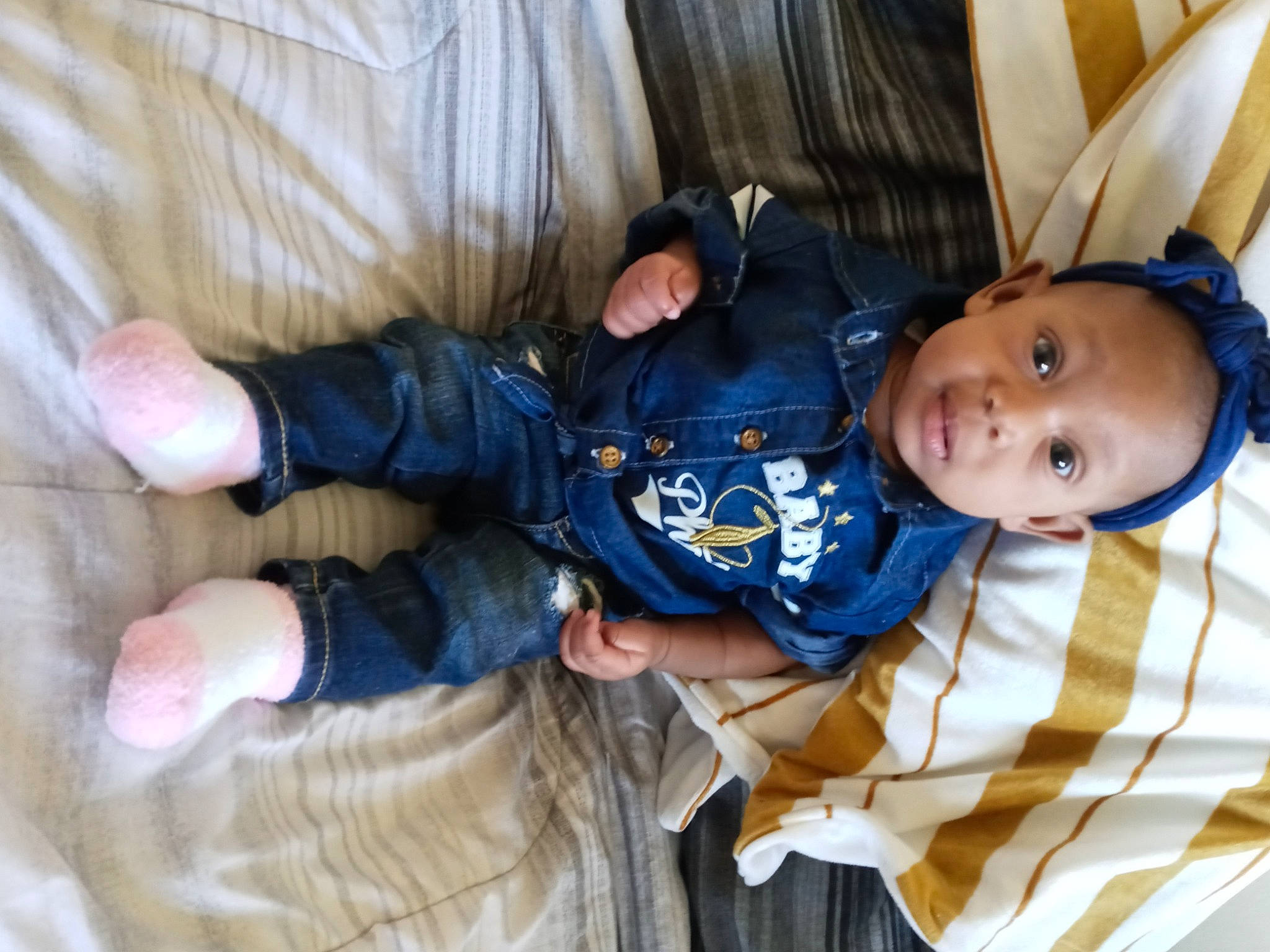 Samiyah joined the competition — help win amazing prizes! baby, baby_products, baby_toddler_clothing, cheek, child, comfort, couch, eye, finger, fun, gesture, hand, head, lap, linens, person, room, sitting, thumb, toddler