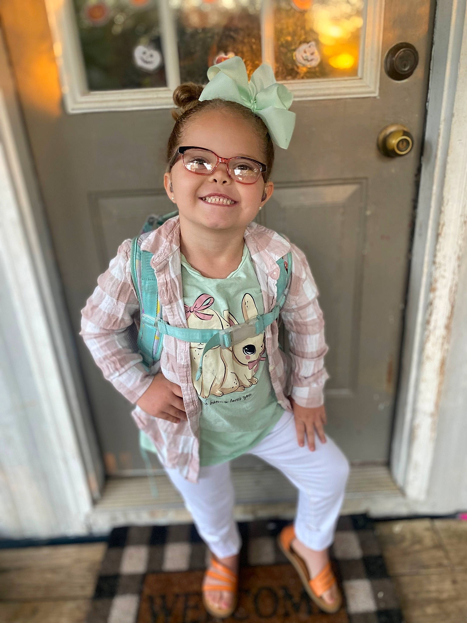 Kota is registered to the contest to win money with this photo: baby_toddler_clothing, child, costume, door, eyewear, fashion_design, flash_photography, flooring, fun, glasses, happy, joy, pattern, person, portrait_photography, room, shoulder, sitting, sleeve, smile