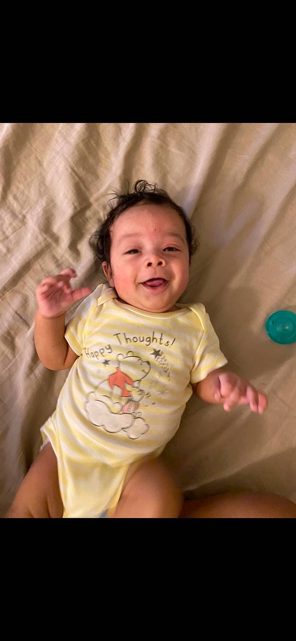 Jayvion is registered to the contest to win money with this photo: arm, baby, baby_toddler_clothing, cheek, comfort, eye, finger, flash_photography, fun, gesture, happy, iris, lip, mouth, nose, person, pink, skin, sleeve, smile